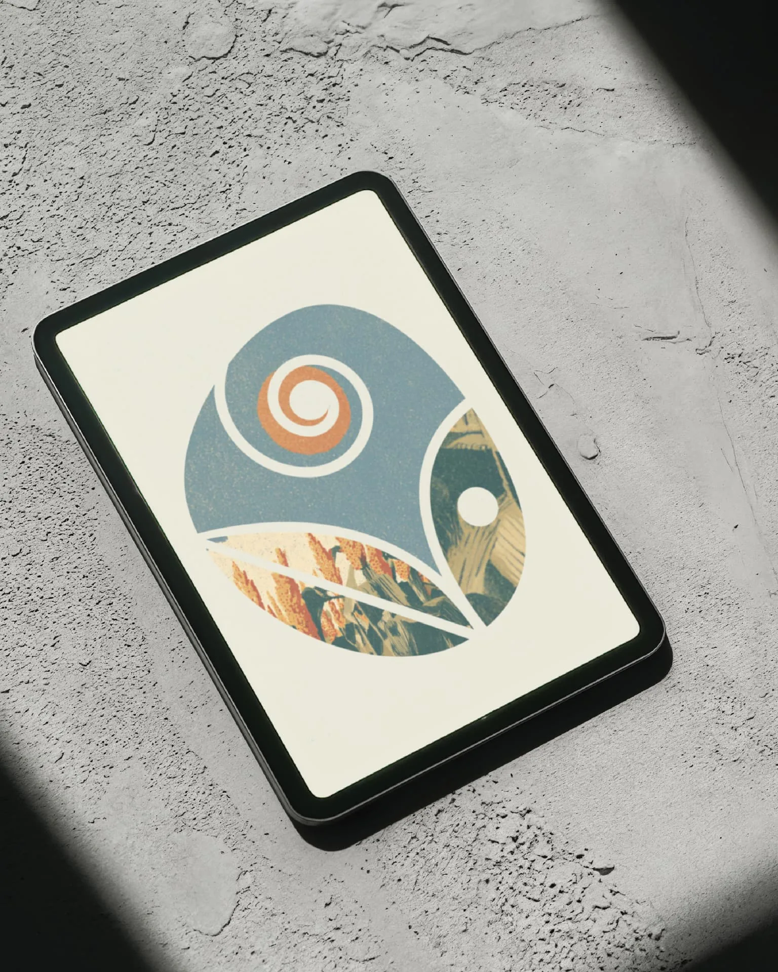 Visv Foundation emblem on a tablet — the seed form shown as a multi-segmented illustration resting on textured concrete