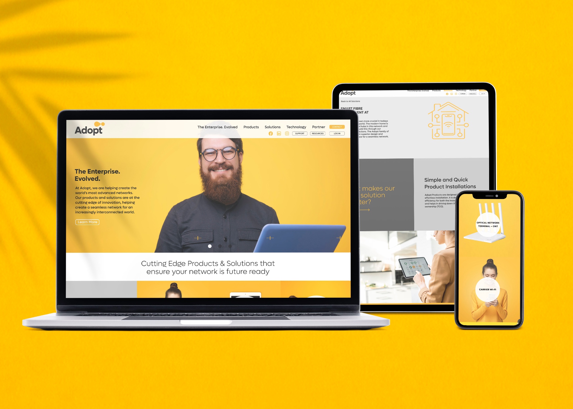 ADOPT - Website design mockup showing laptop, tablet and mobile with The Enterprise Evolved branding